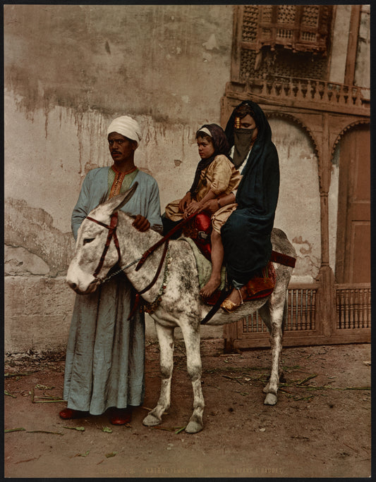 A picture of Kairo. Femme Arabe et son enfant à baudet