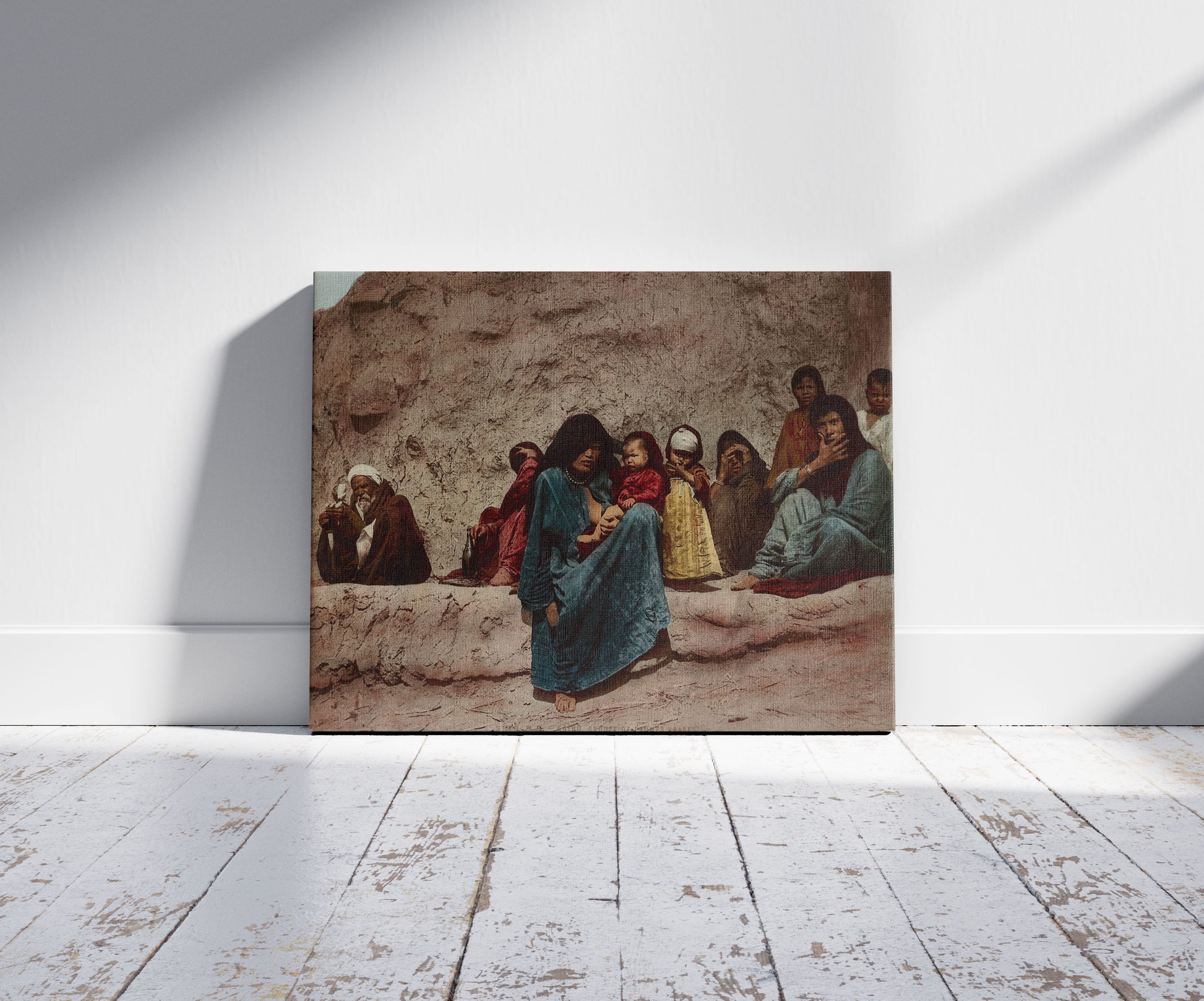 A picture of Kairo, groupe de femmes Arabes, a mockup of the print leaning against a wall