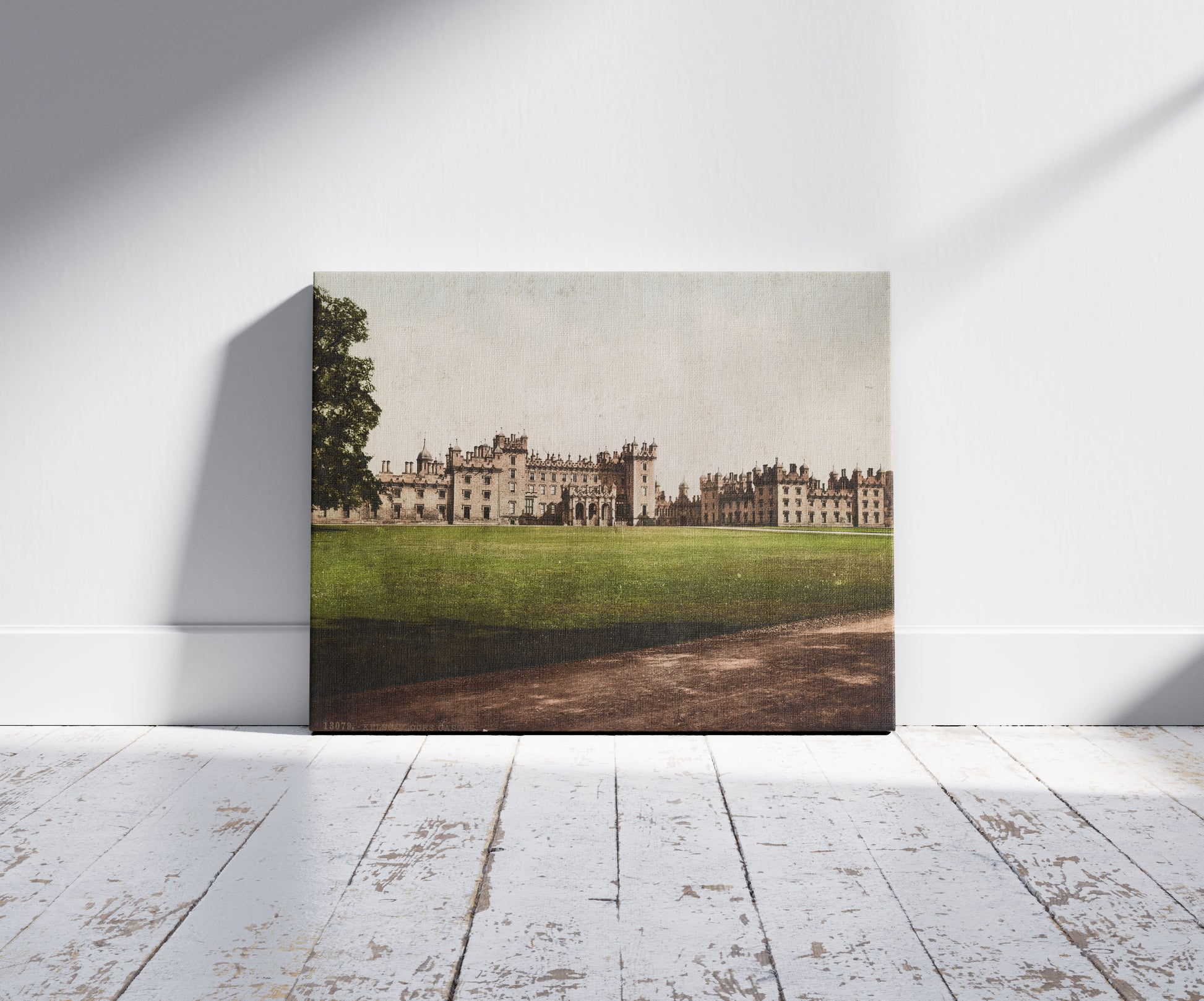 A picture of Kelso. Floors Castle, a mockup of the print leaning against a wall