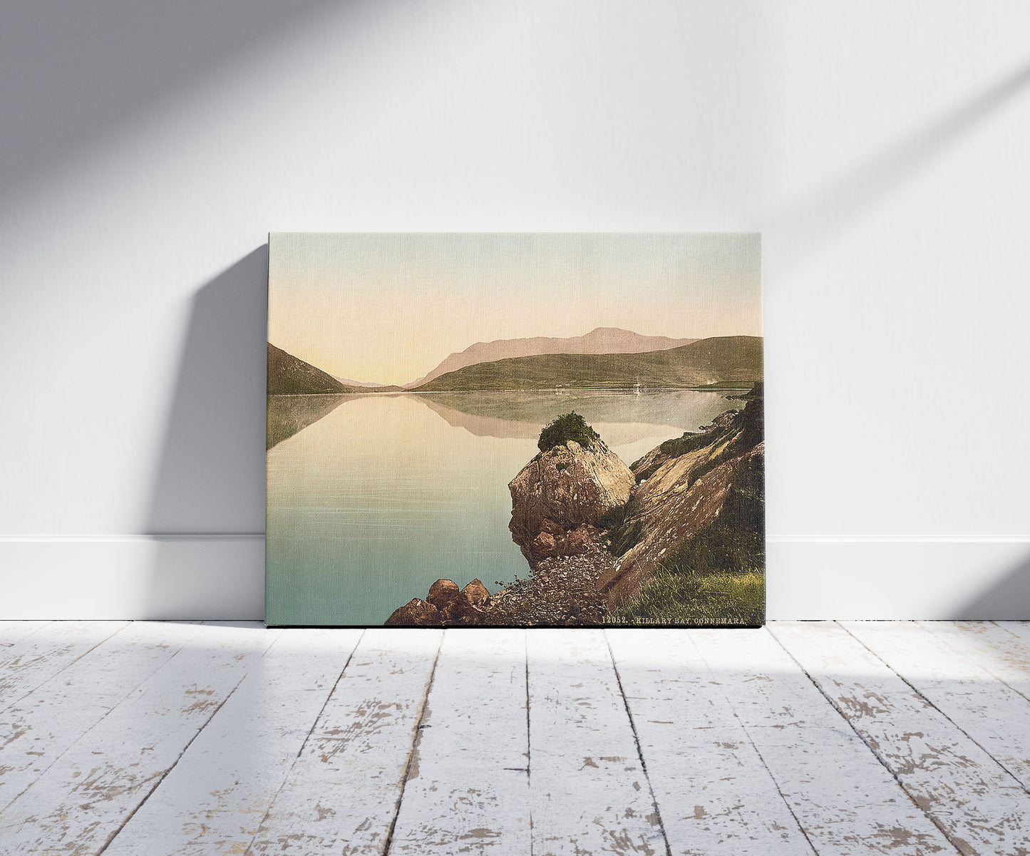 A picture of Killary Bay, Connemara. County Galway, Ireland, a mockup of the print leaning against a wall