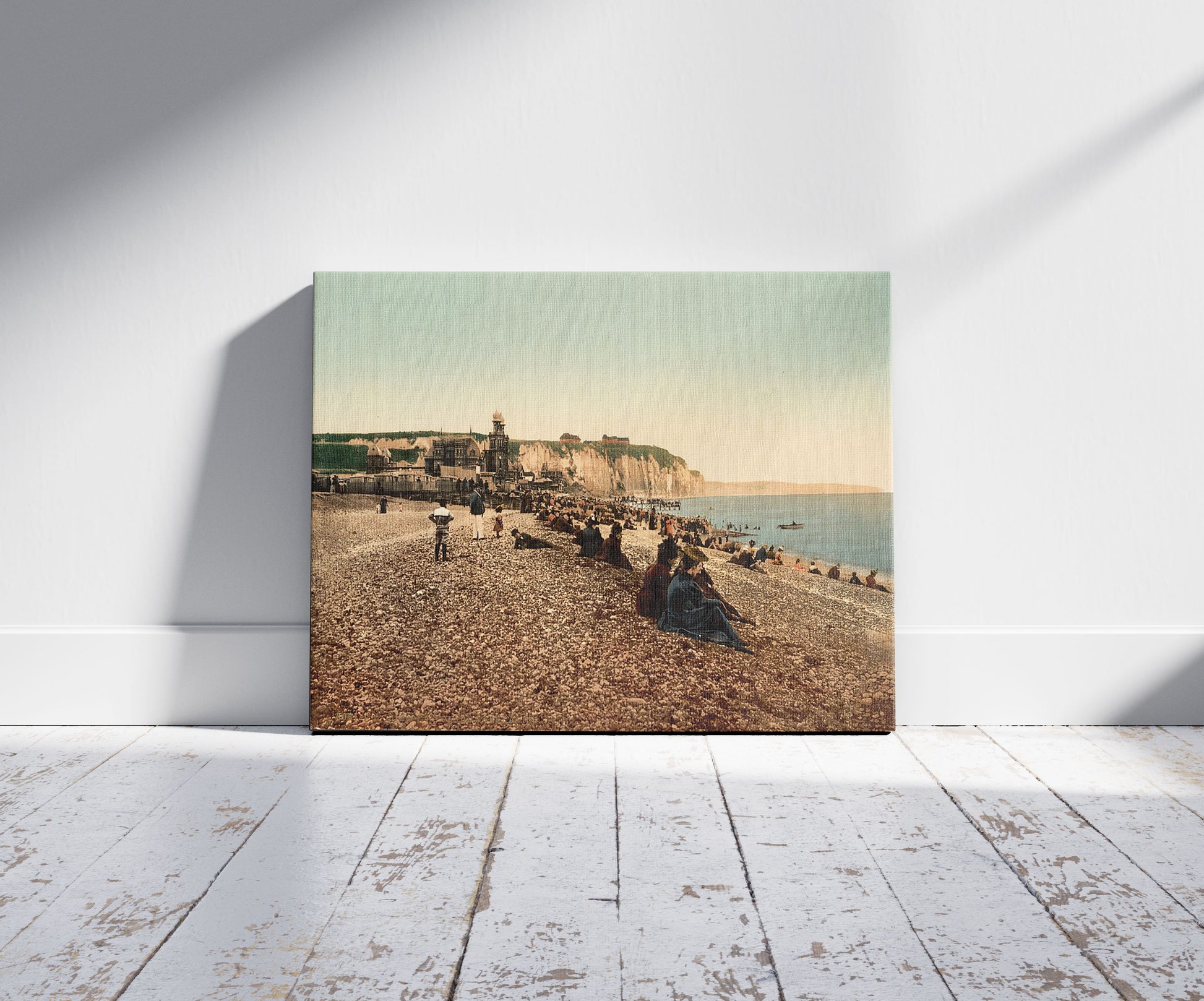 A picture of La plage et le casino, Dieppe, France, a mockup of the print leaning against a wall