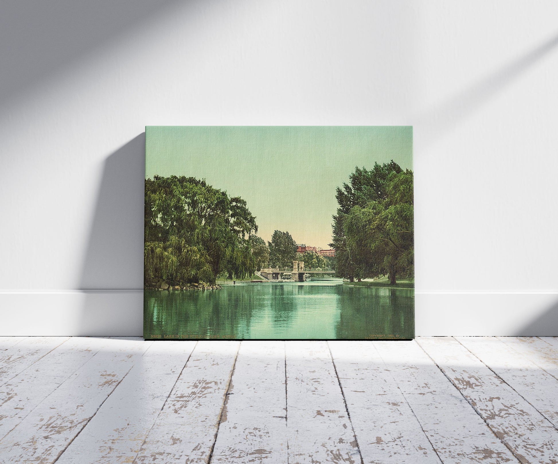 A picture of Lake in the Public Garden, Boston, a mockup of the print leaning against a wall