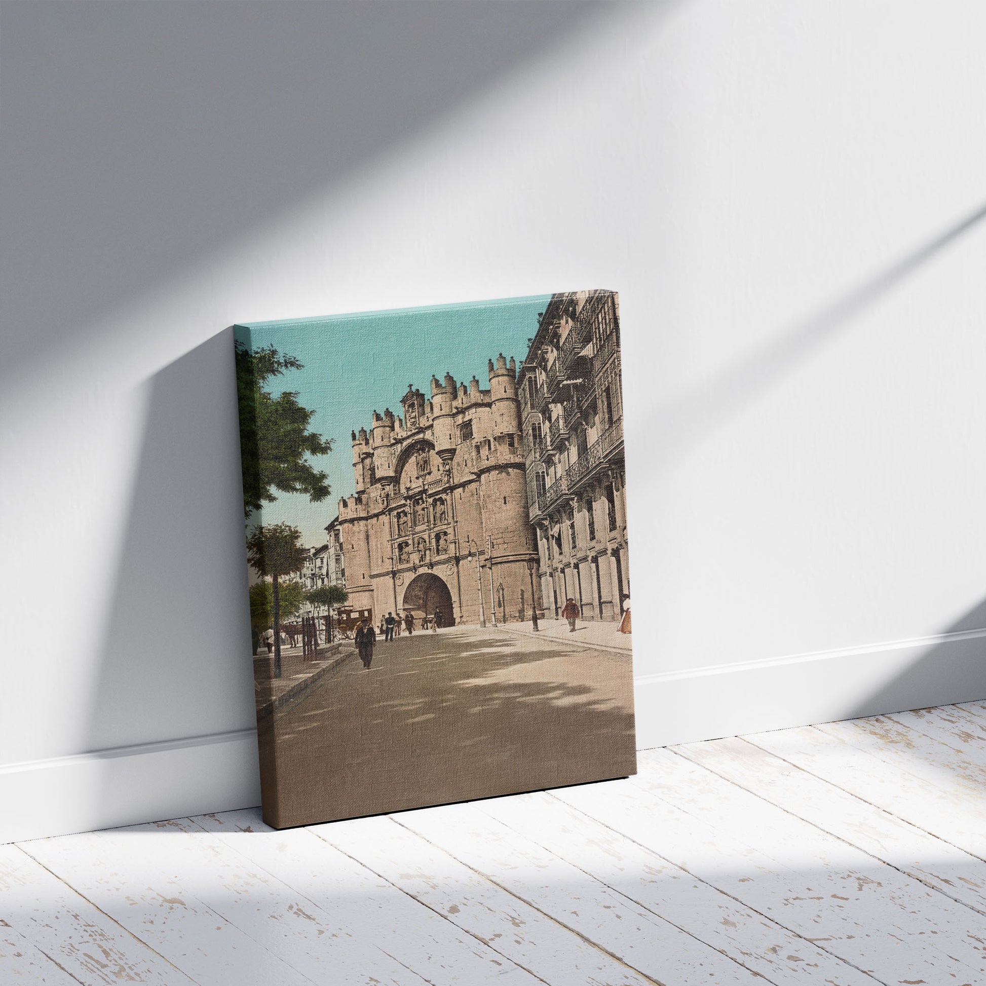 A picture of L'Arc de Triomphe, a mockup of the print leaning against a wall