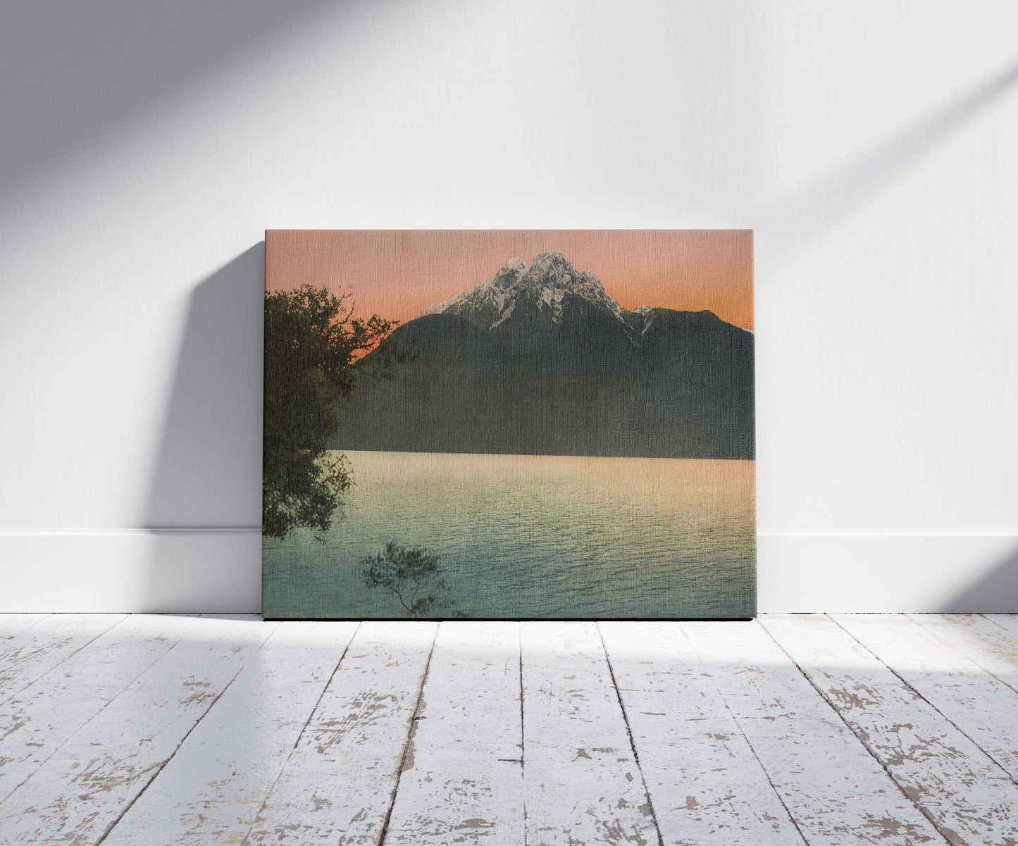 A picture of Largs Peak. Lake Te Anau, a mockup of the print leaning against a wall