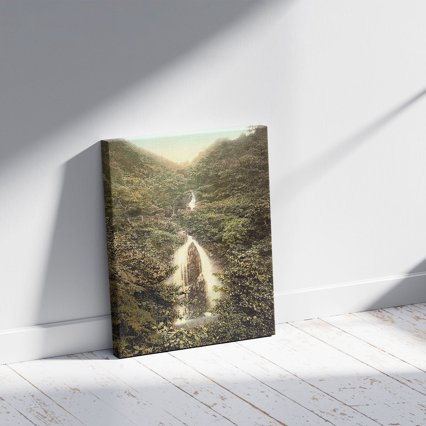 A picture of Laxey, Doon Glen Waterfall, Isle of Man, a mockup of the print leaning against a wall