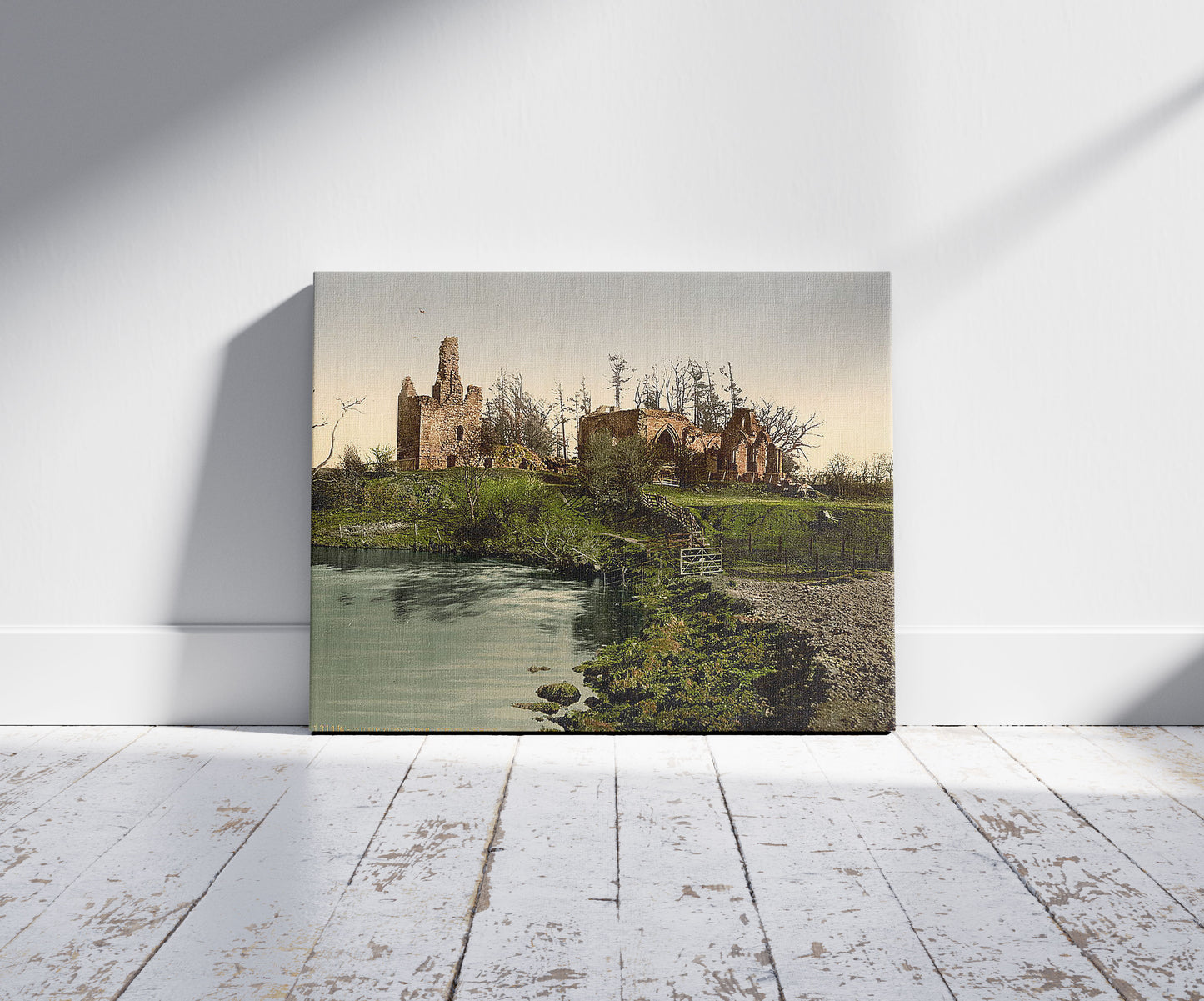 A picture of Lincluden Abbey, Dumfries, Scotland, a mockup of the print leaning against a wall