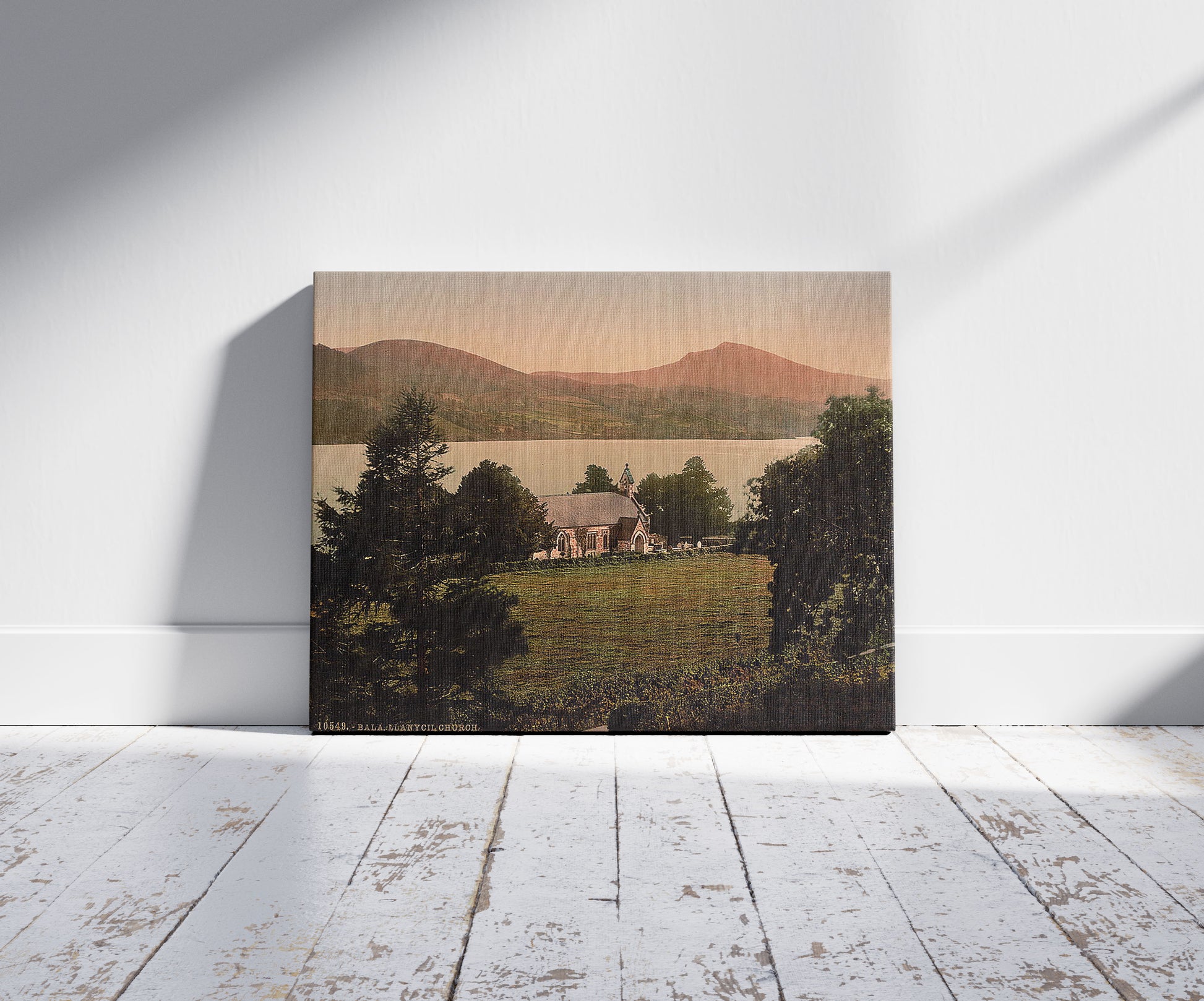 A picture of Llanycil Church, Bala, Wales, a mockup of the print leaning against a wall