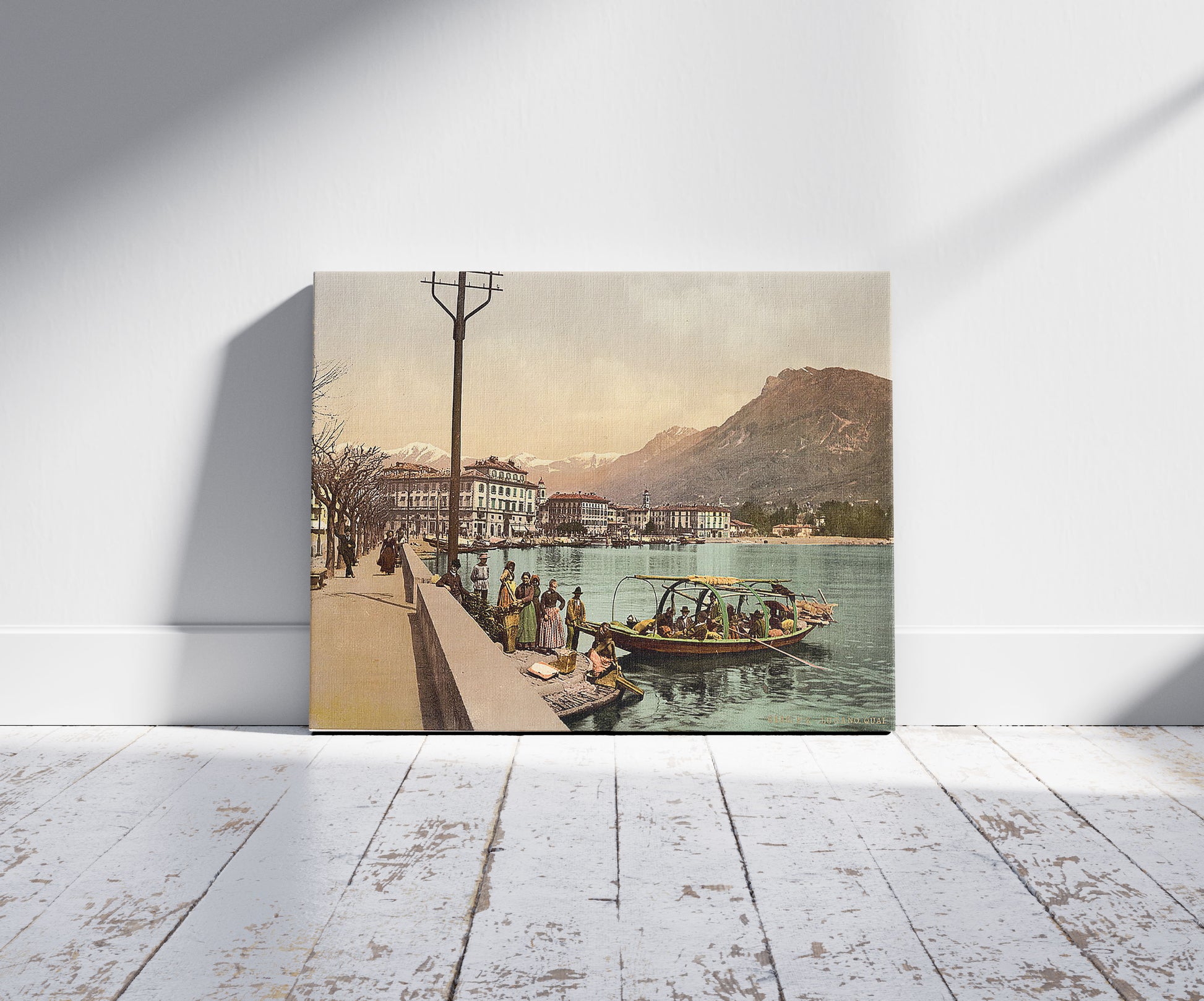 A picture of Lugano, on the quay, Tessin, Switzerland, a mockup of the print leaning against a wall
