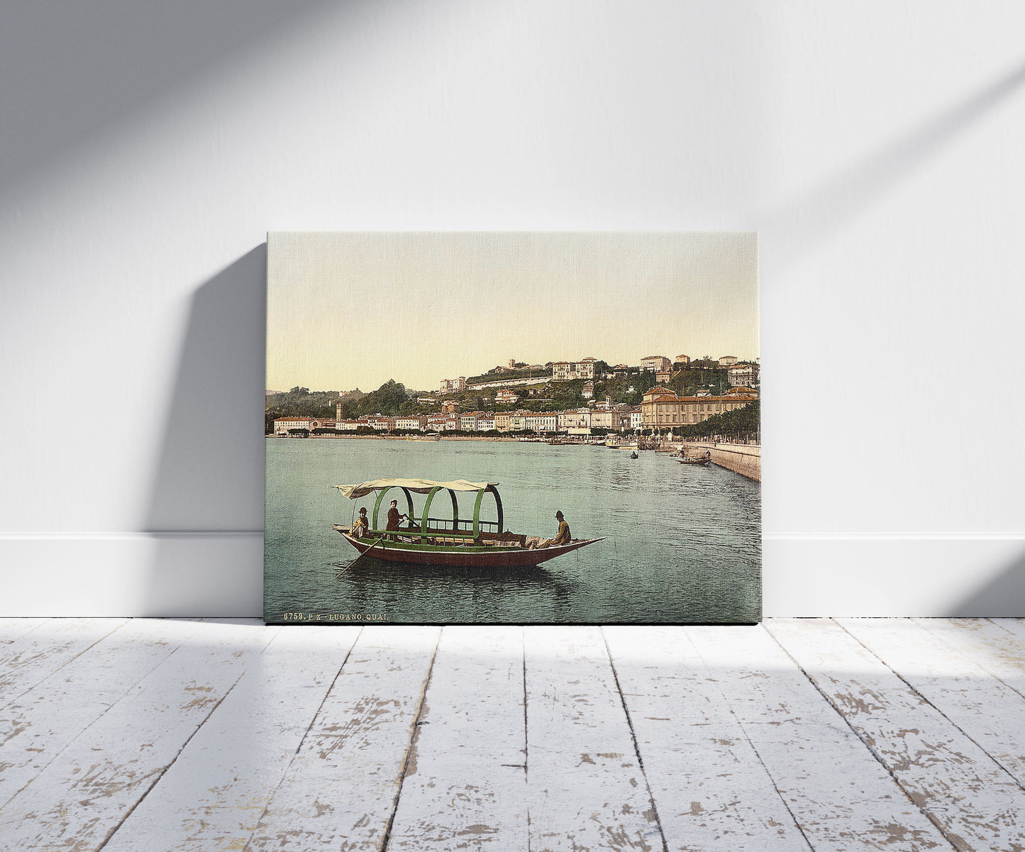 A picture of Lugano, the quay, Tessin, Switzerland, a mockup of the print leaning against a wall