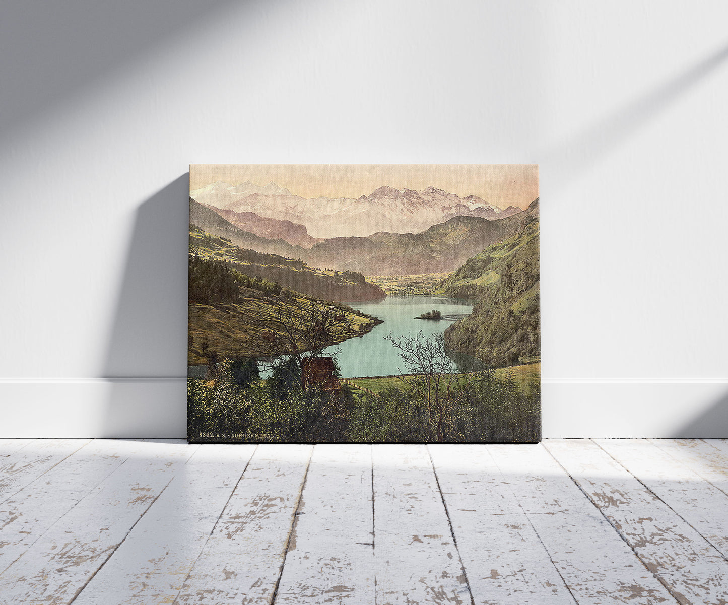 A picture of Lungern, general view, Switzerland, a mockup of the print leaning against a wall