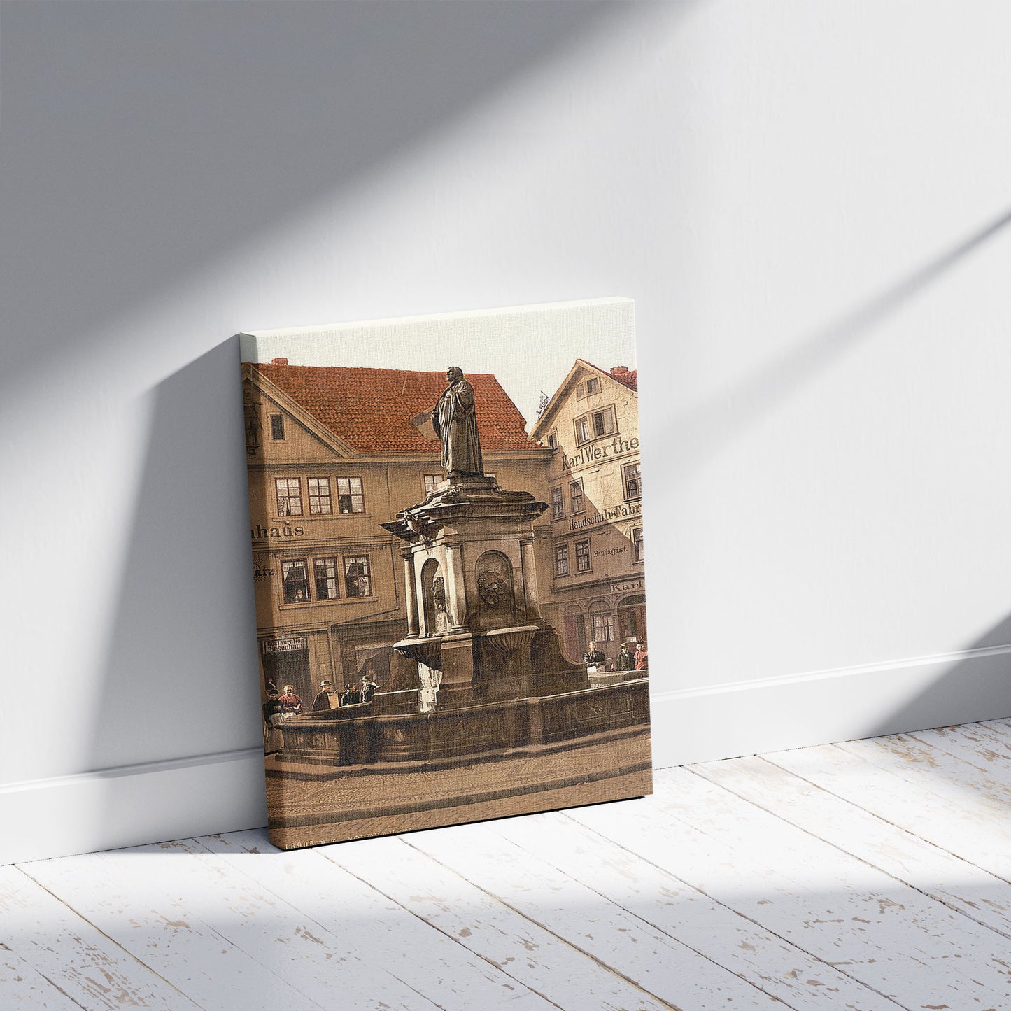 A picture of Luther Fountain at Riesenhaus, Nordhausen, Thuringia, Germany, a mockup of the print leaning against a wall