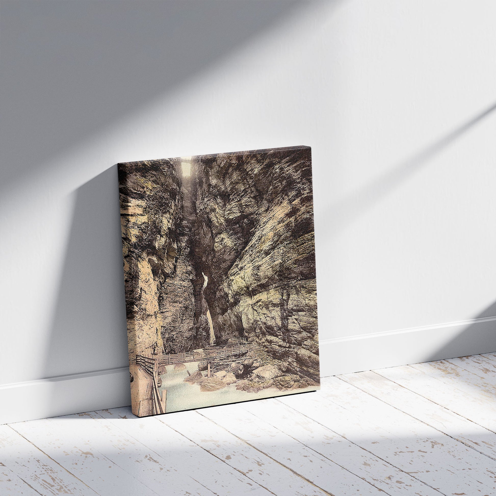 A picture of Lütschine Gorge, Bernese Oberland, Switzerland, a mockup of the print leaning against a wall