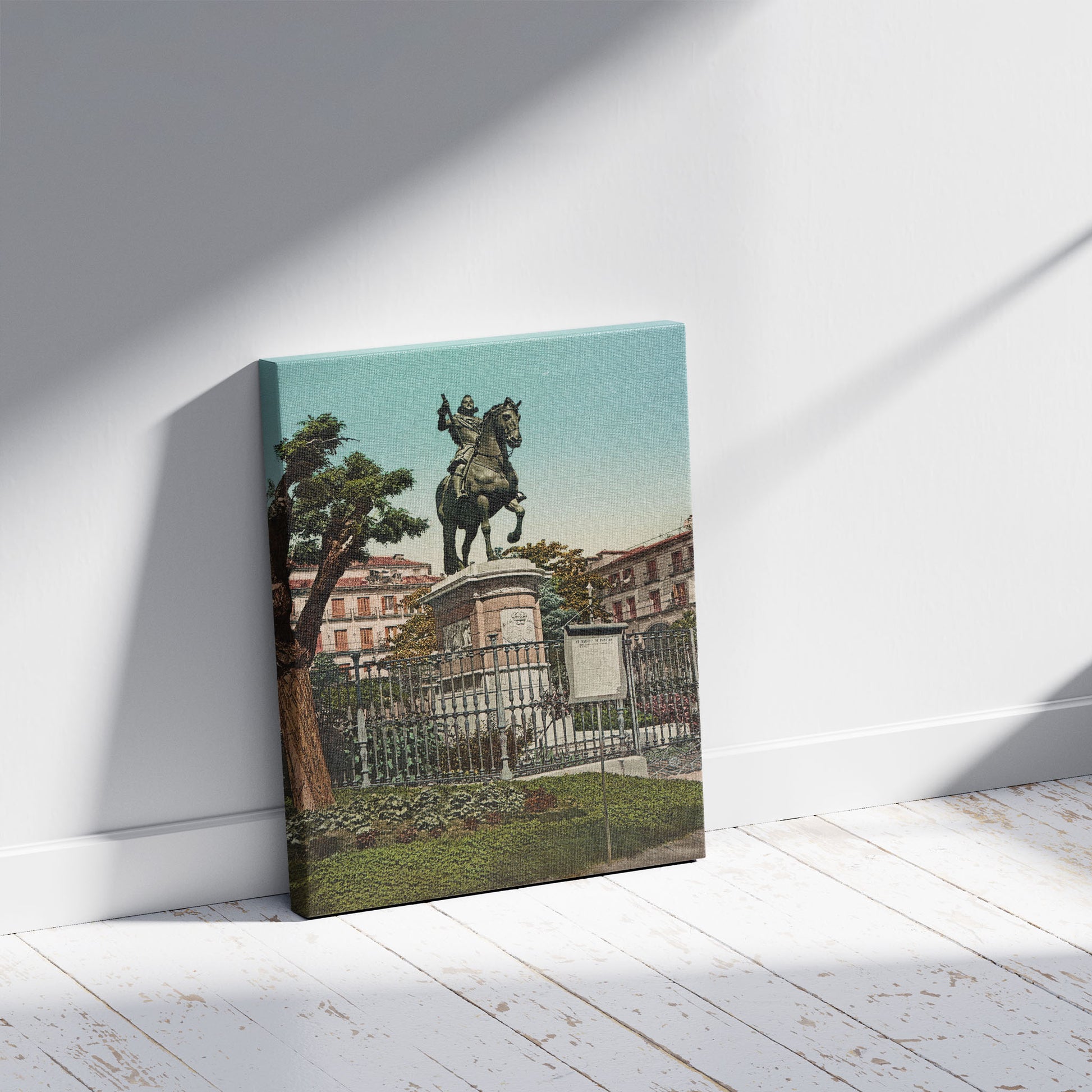 A picture of Madrid. Monumento de Felipe III, a mockup of the print leaning against a wall