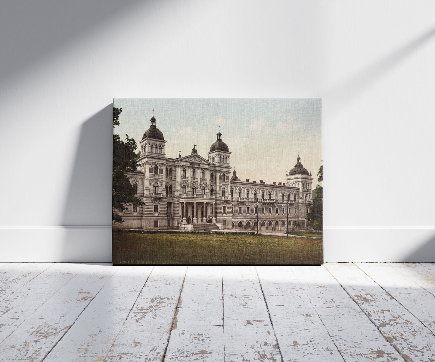 A picture of Marienbad. Das Neubad, a mockup of the print leaning against a wall