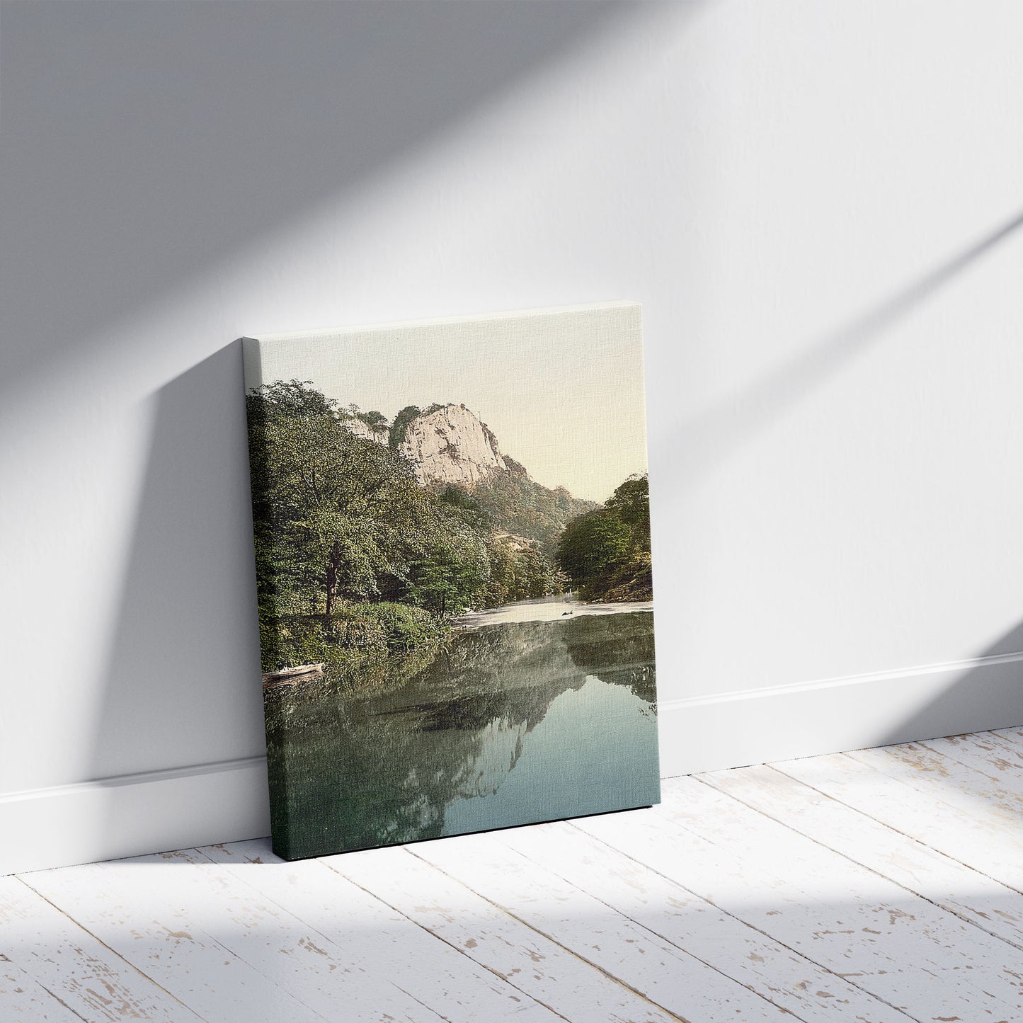 A picture of Matlock High Tor, III., Derbyshire, England, a mockup of the print leaning against a wall