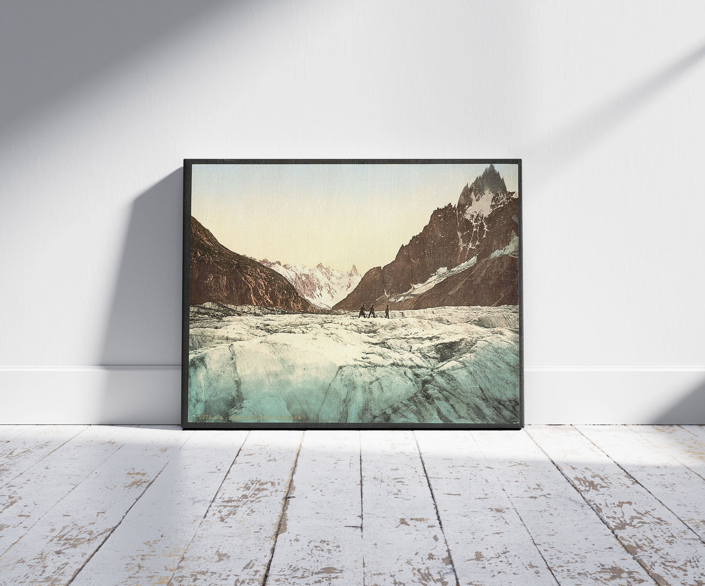 A picture of Mer de Glace, Mont Blanc, Chamonix Valley, France, a mockup of the print leaning against a wall