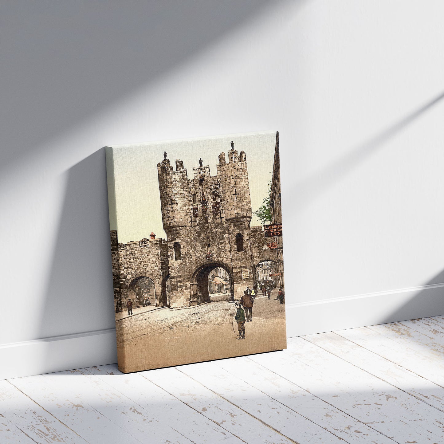 A picture of Micklegate Bar, York, England, a mockup of the print leaning against a wall