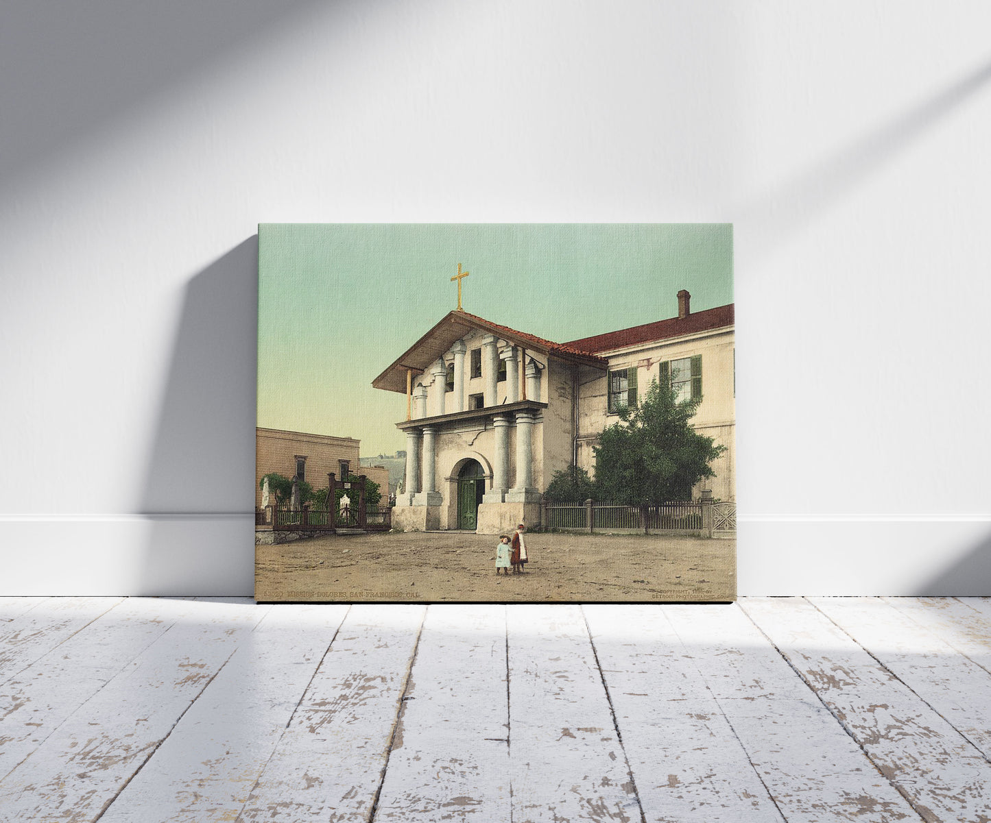 A picture of Mission Dolores, San Francisco, Cal., a mockup of the print leaning against a wall