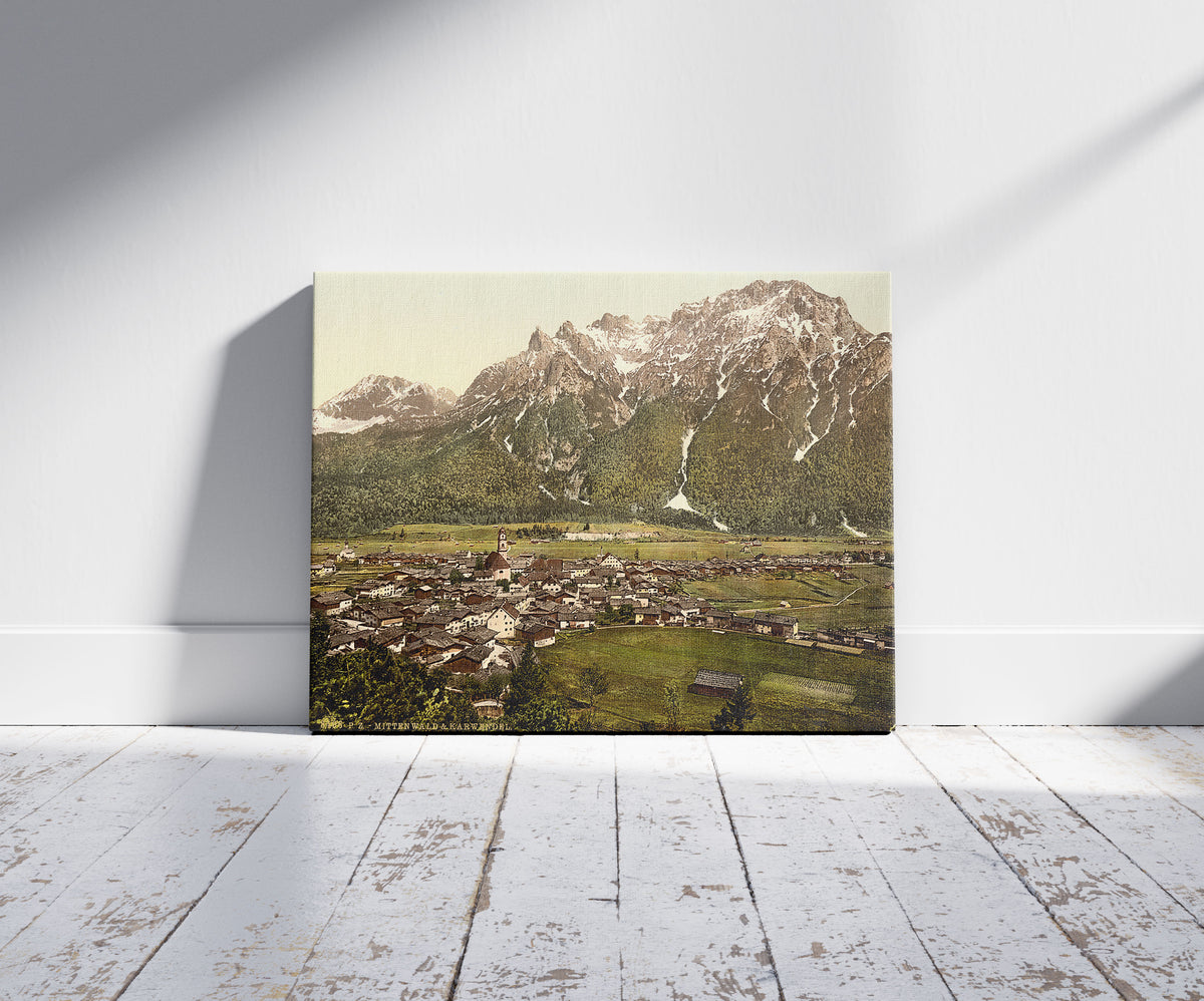 A picture of Mittenwald and Carwendel (i.e. Karwendel), Upper Bavaria, Germany, a mockup of the print leaning against a wall