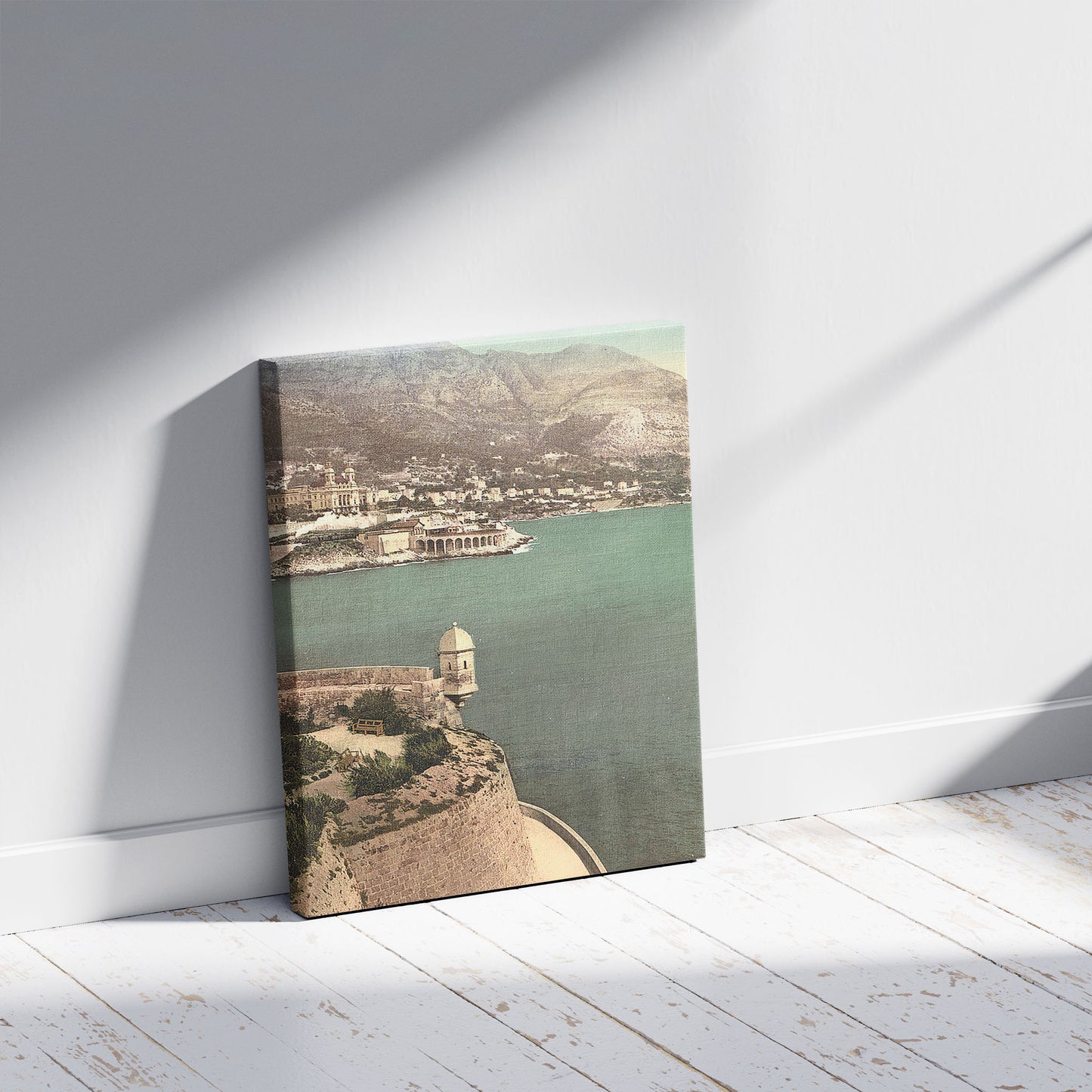 A picture of Monte Carlo, from Fort Antoine, Monaco (Riviera), a mockup of the print leaning against a wall