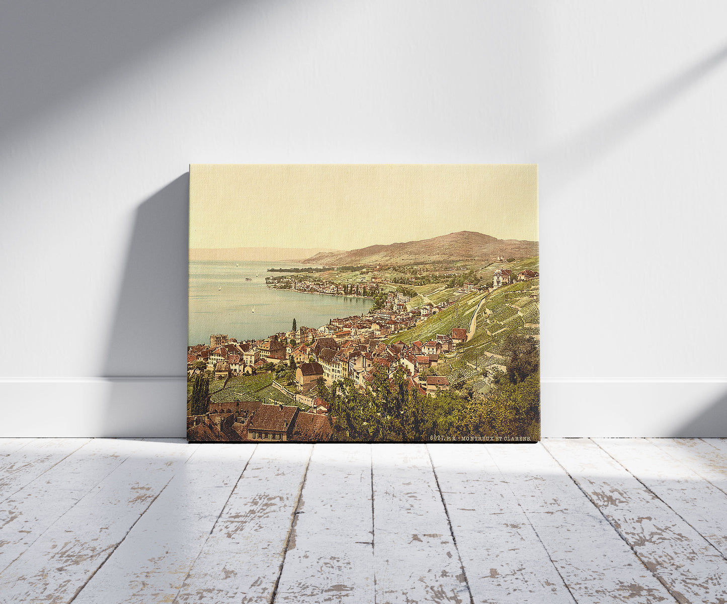 A picture of Montreux and Clarens, Geneva Lake, Switzerland, a mockup of the print leaning against a wall