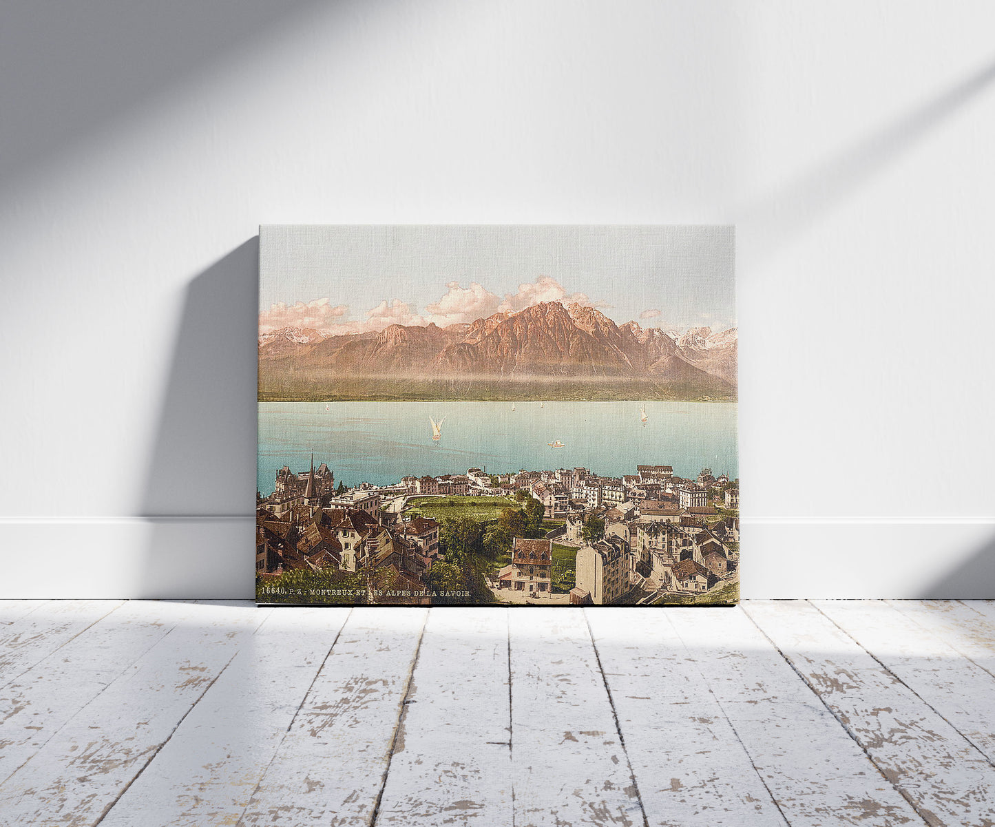A picture of Montreux, Savoy Mountains, Geneva Lake, Switzerland, a mockup of the print leaning against a wall
