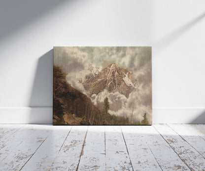 A picture of Mount of the Holy Cross in the clouds, a mockup of the print leaning against a wall