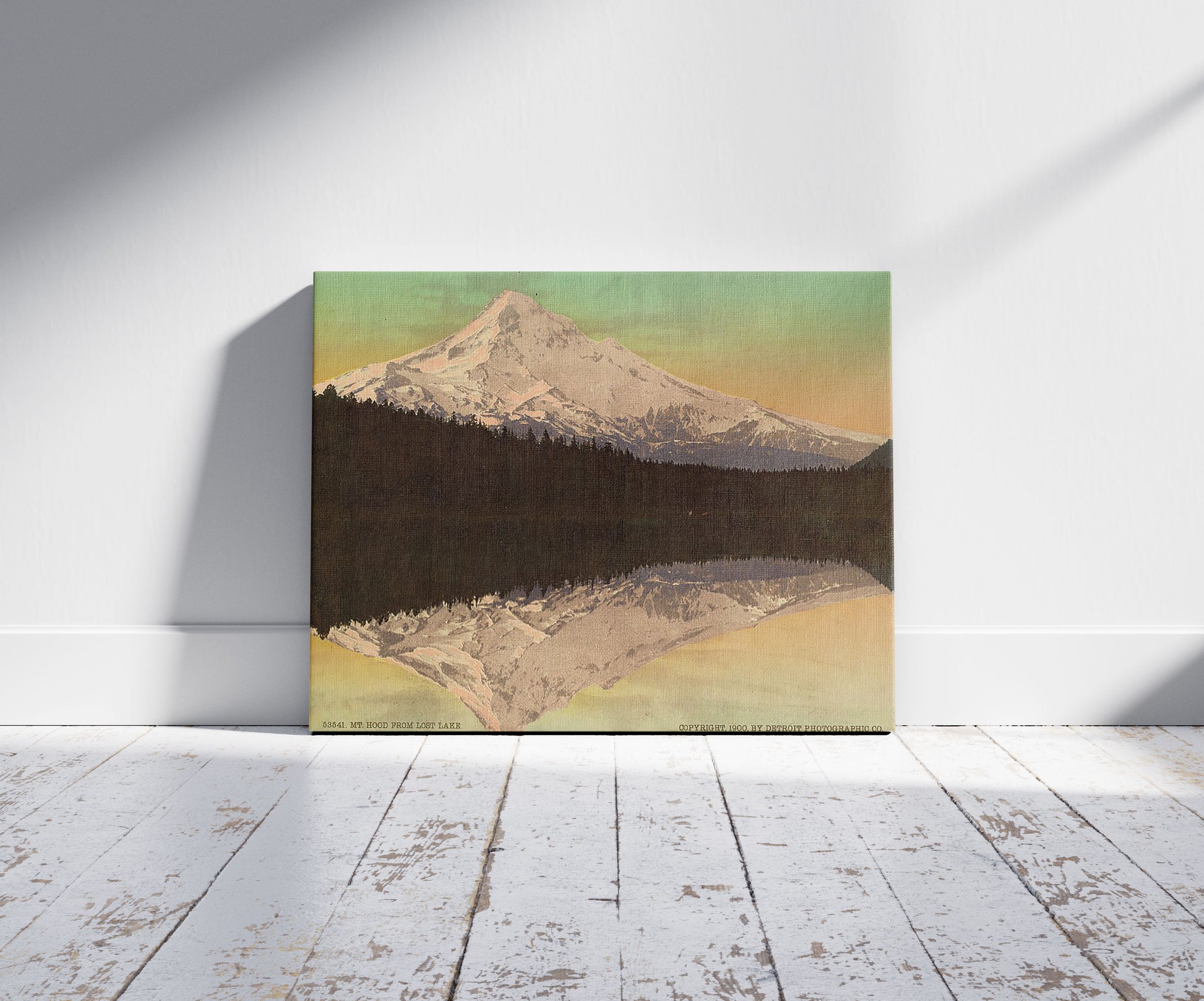 A picture of Mt. Hood from Lost Lake, a mockup of the print leaning against a wall