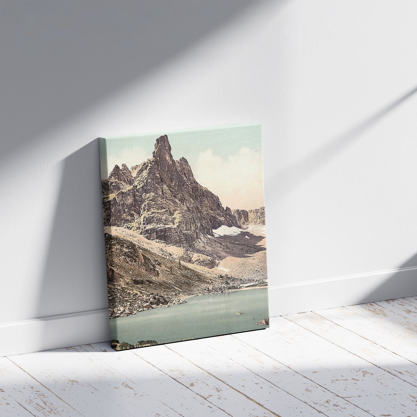 A picture of Mt. Surlon and Sorapiss, Tyrol, Austro-Hungary, a mockup of the print leaning against a wall