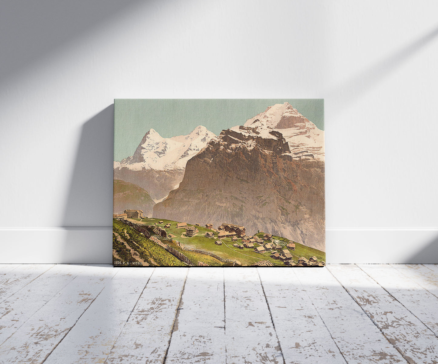 A picture of Murren, general view, Bernese Oberland, Switzerland, a mockup of the print leaning against a wall