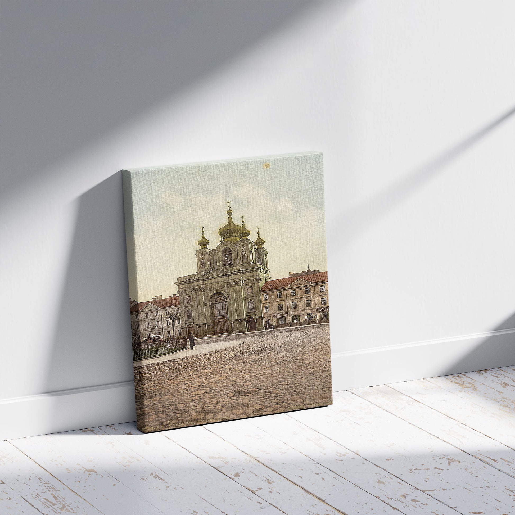 A picture of n church, Warsaw, Poland, a mockup of the print leaning against a wall