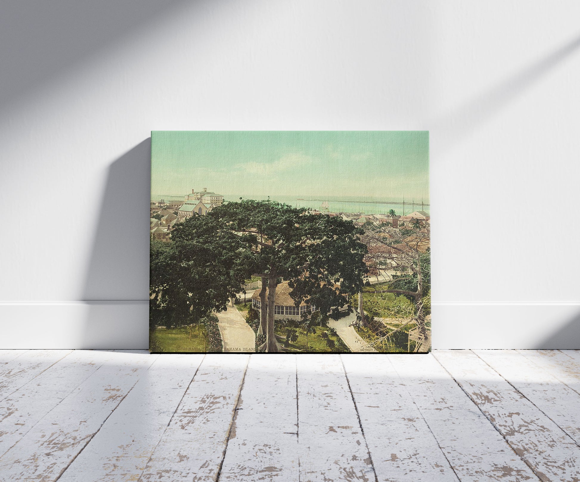 A picture of Nassau Harbor, Bahama Islands, a mockup of the print leaning against a wall