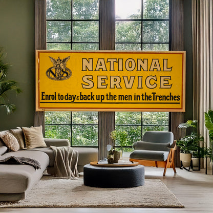 A picture of National service. Enrol today & back up the men in the trenches, a mockup of the print leaning against a wall