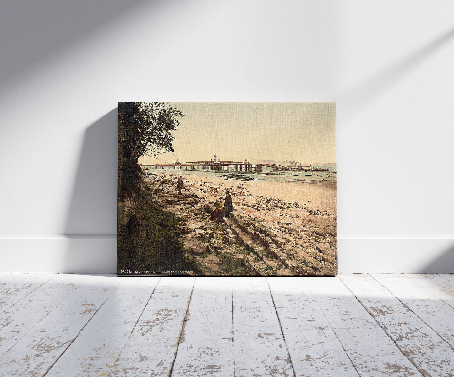 A picture of New Brighton Pier, Liverpool, England, a mockup of the print leaning against a wall