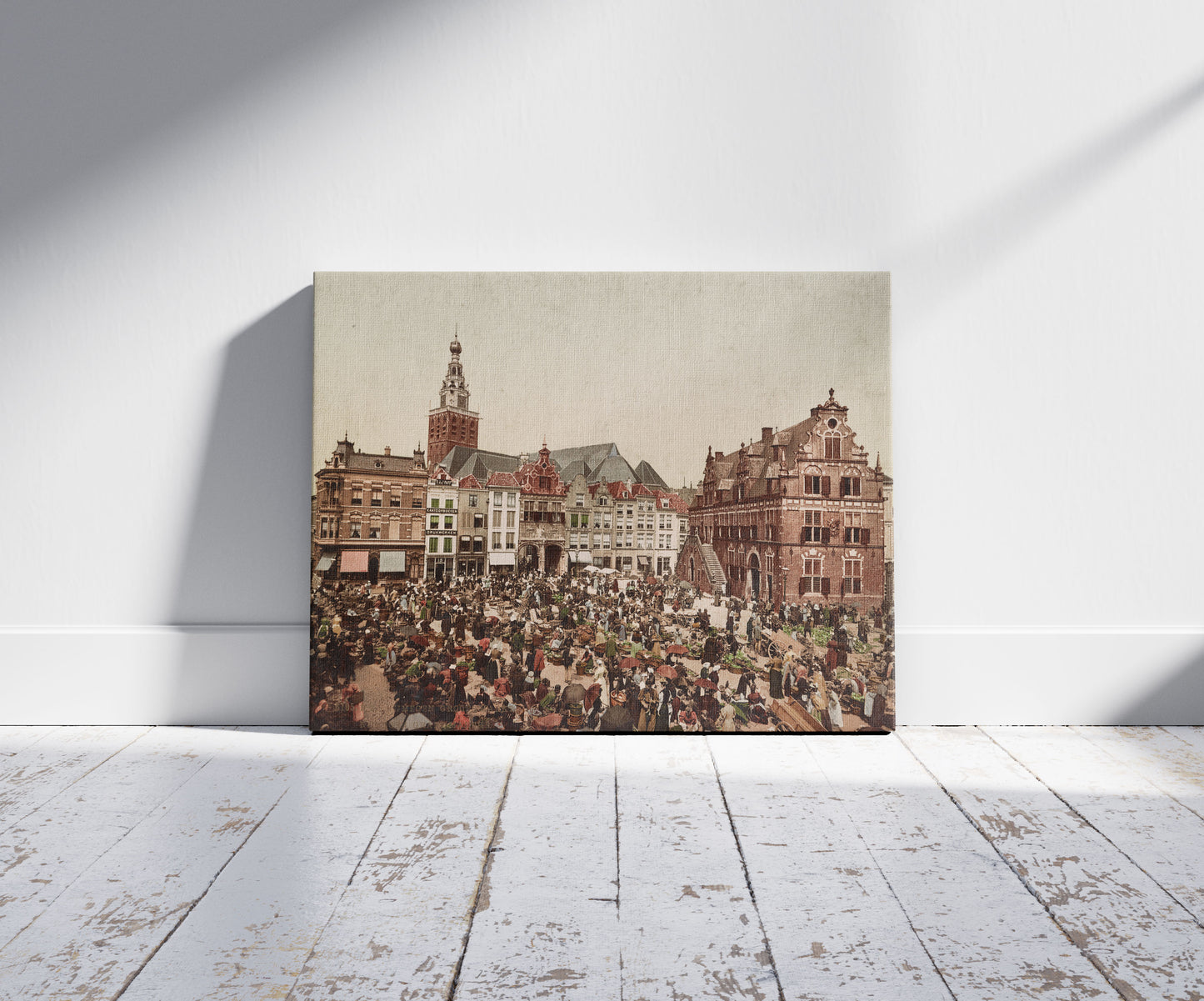 A picture of Nijmegen groote markt, a mockup of the print leaning against a wall