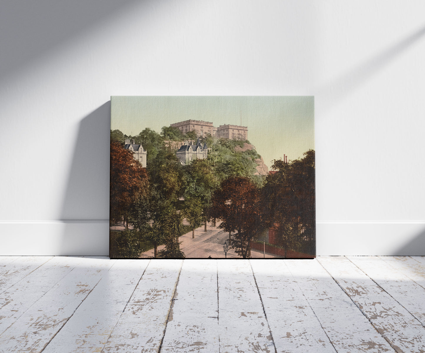 A picture of Nottingham Castle, a mockup of the print leaning against a wall