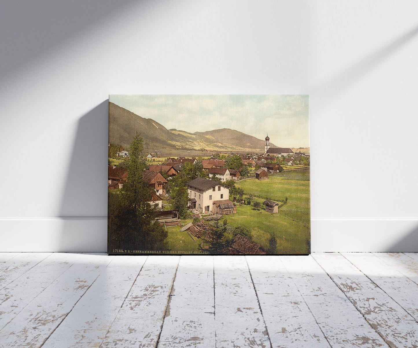 A picture of Oberammergau from Ettaler Street, Upper Bavaria, Germany, a mockup of the print leaning against a wall