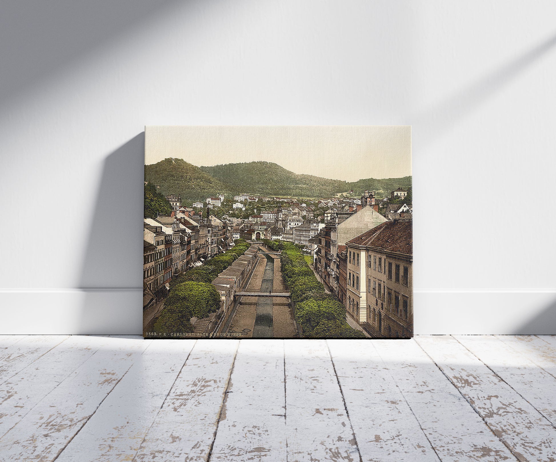 A picture of Old and new roads, Carlsbad, Bohemia, Austro-Hungary, a mockup of the print leaning against a wall