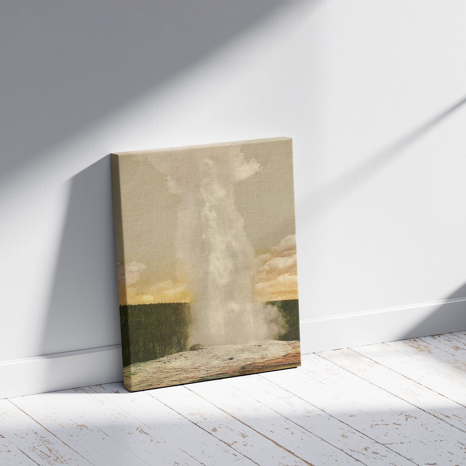 A picture of "Old Faithful" Geyser, Yellowstone National Park, a mockup of the print leaning against a wall