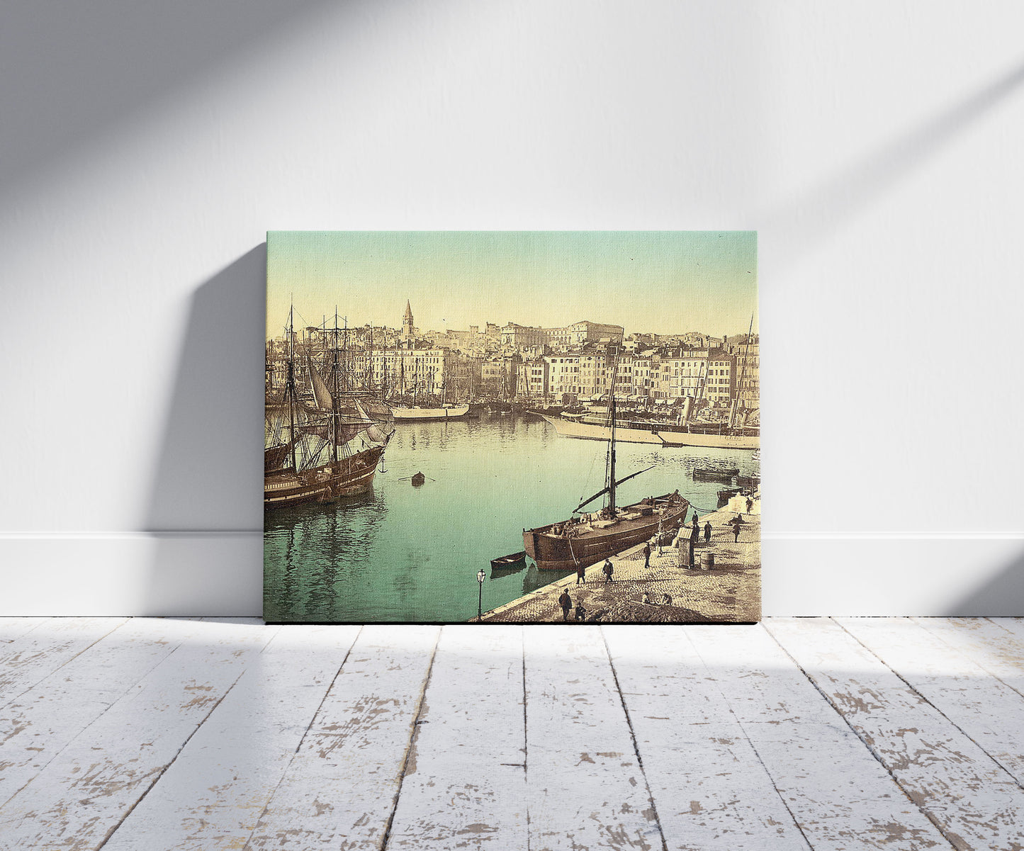 A picture of Old Harbor (Vieux-Port), Marseille, France, with Hôtel-Dieu Hospital in background, a mockup of the print leaning against a wall