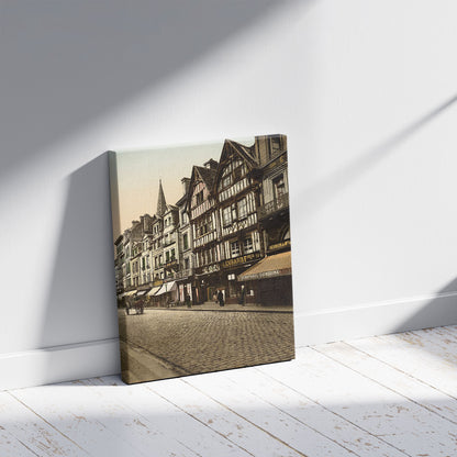 A picture of Old houses in rue St. Pierre, Caen, France, a mockup of the print leaning against a wall