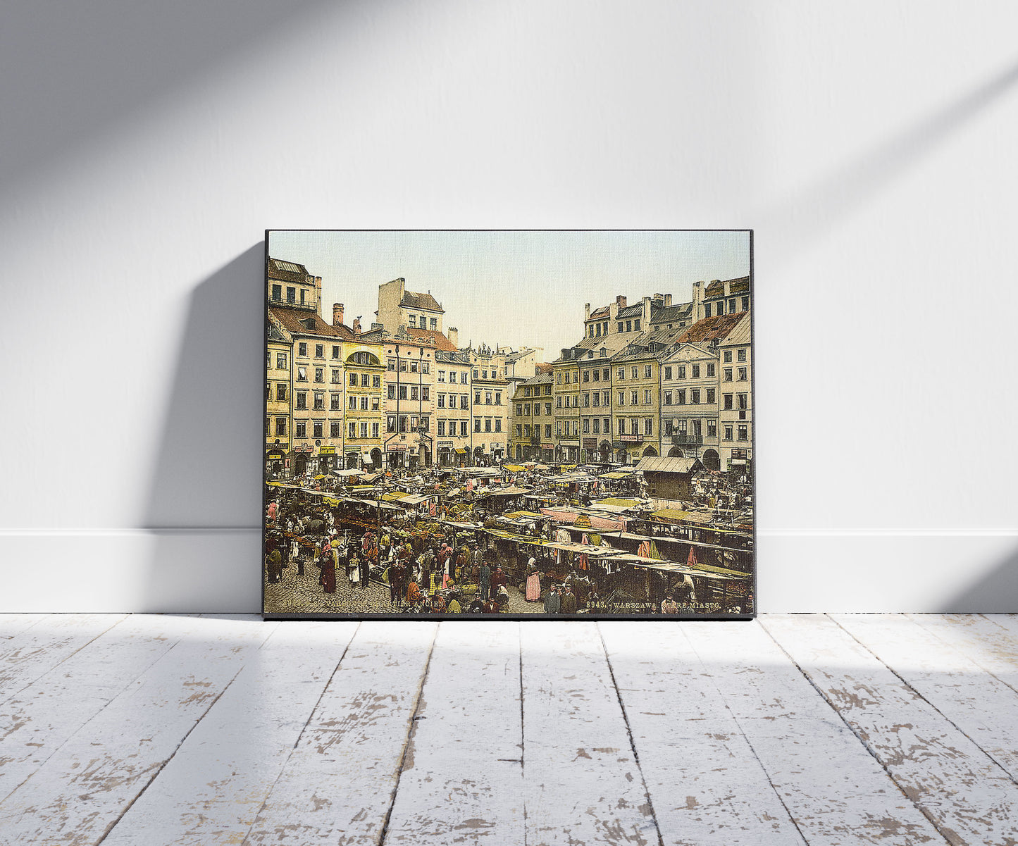 A picture of Old part of town, Warsaw, Poland, a mockup of the print leaning against a wall