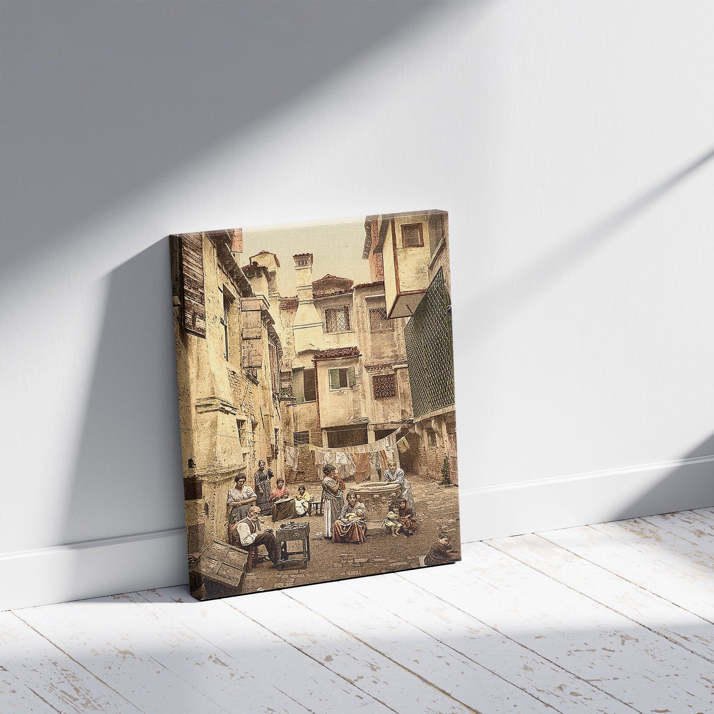 A picture of Old Venetian courtyard, Venice, Italy, a mockup of the print leaning against a wall