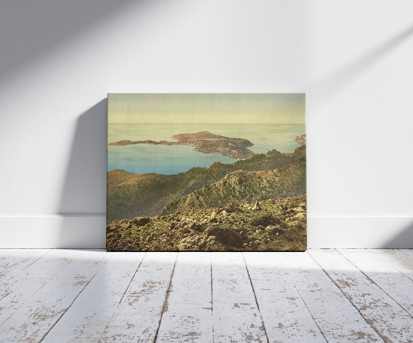 A picture of On the Corniche Road, Nice, Riviera, a mockup of the print leaning against a wall