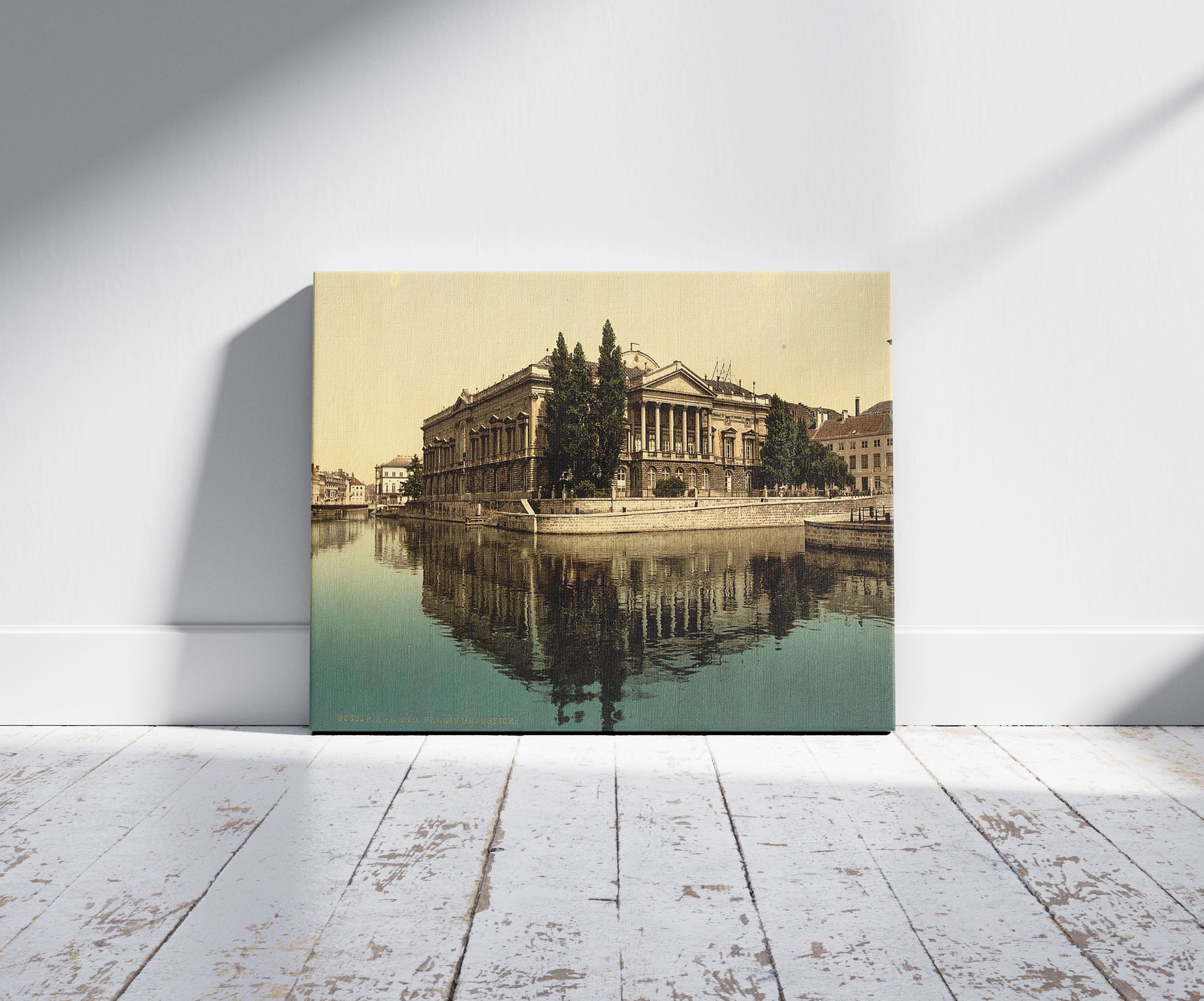 A picture of Palais de Justice, Ghent, Belgium, a mockup of the print leaning against a wall