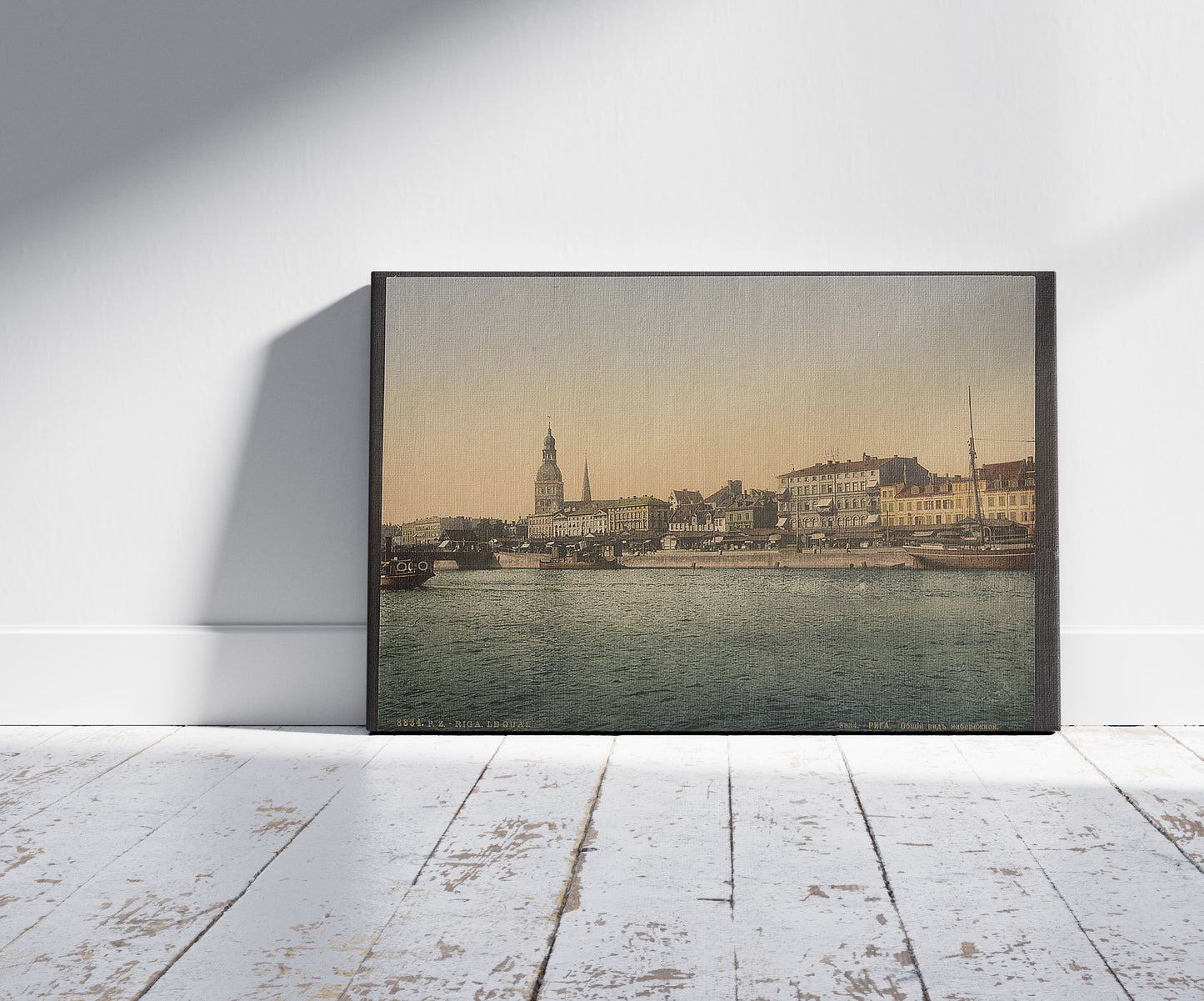 A picture of Panorama by the quay, Riga, Latvia, a mockup of the print leaning against a wall