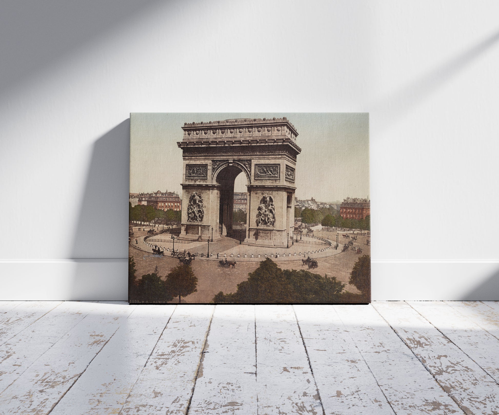 A picture of Paris. L'Arc-de-Triomphe de L'Etoile, a mockup of the print leaning against a wall