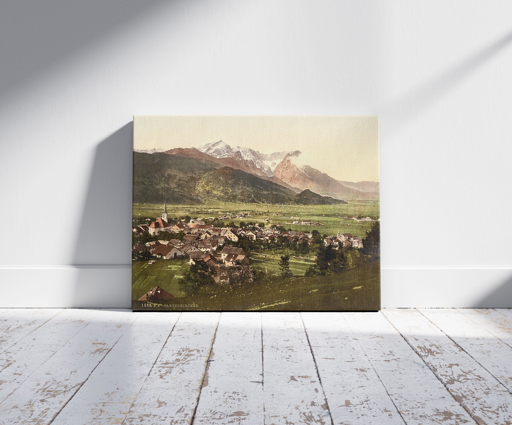A picture of Partenkirchen, general view,  Upper Bavaria, Germany, a mockup of the print leaning against a wall