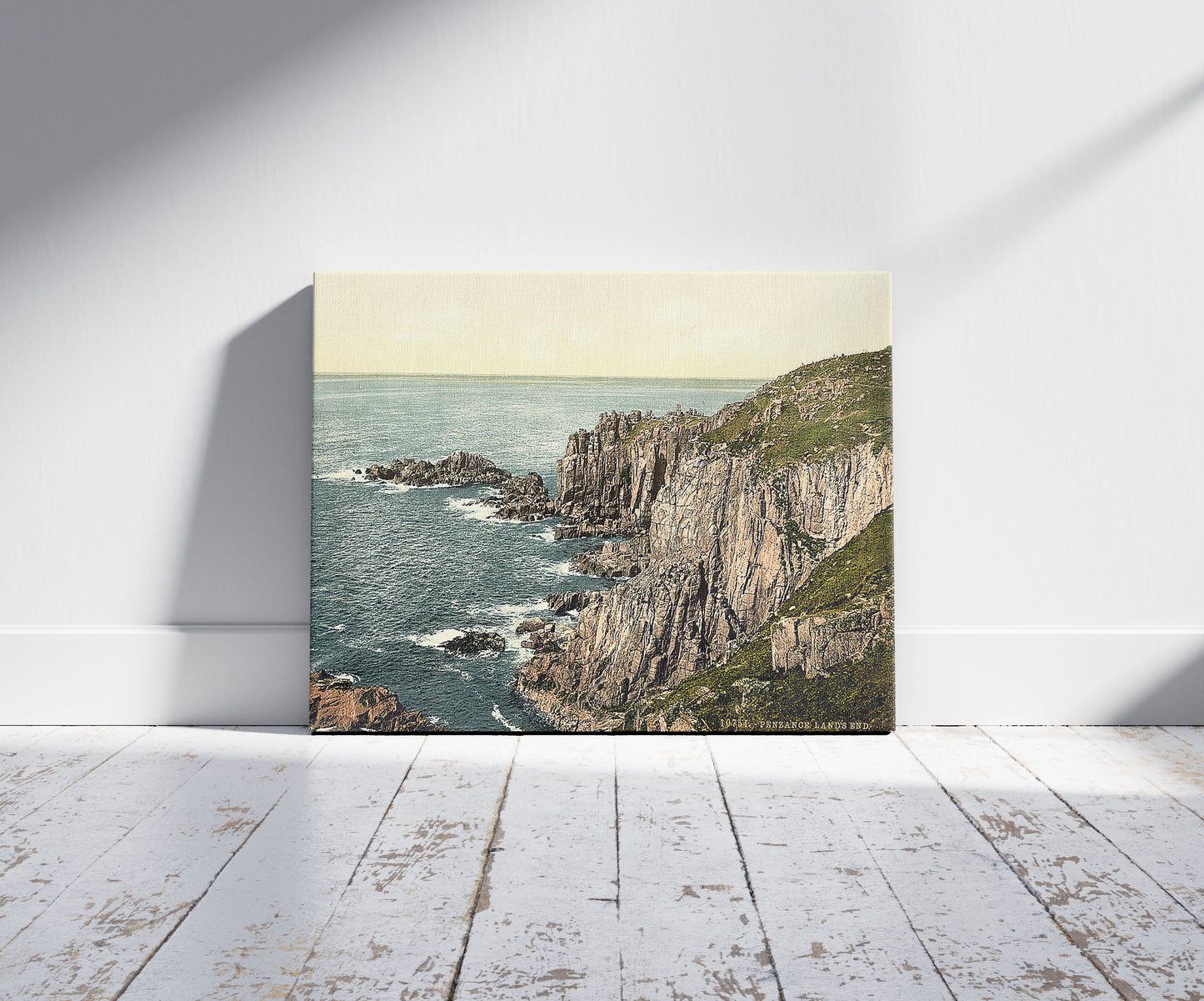 A picture of Penzance, Land's End, Cornwall, England, a mockup of the print leaning against a wall