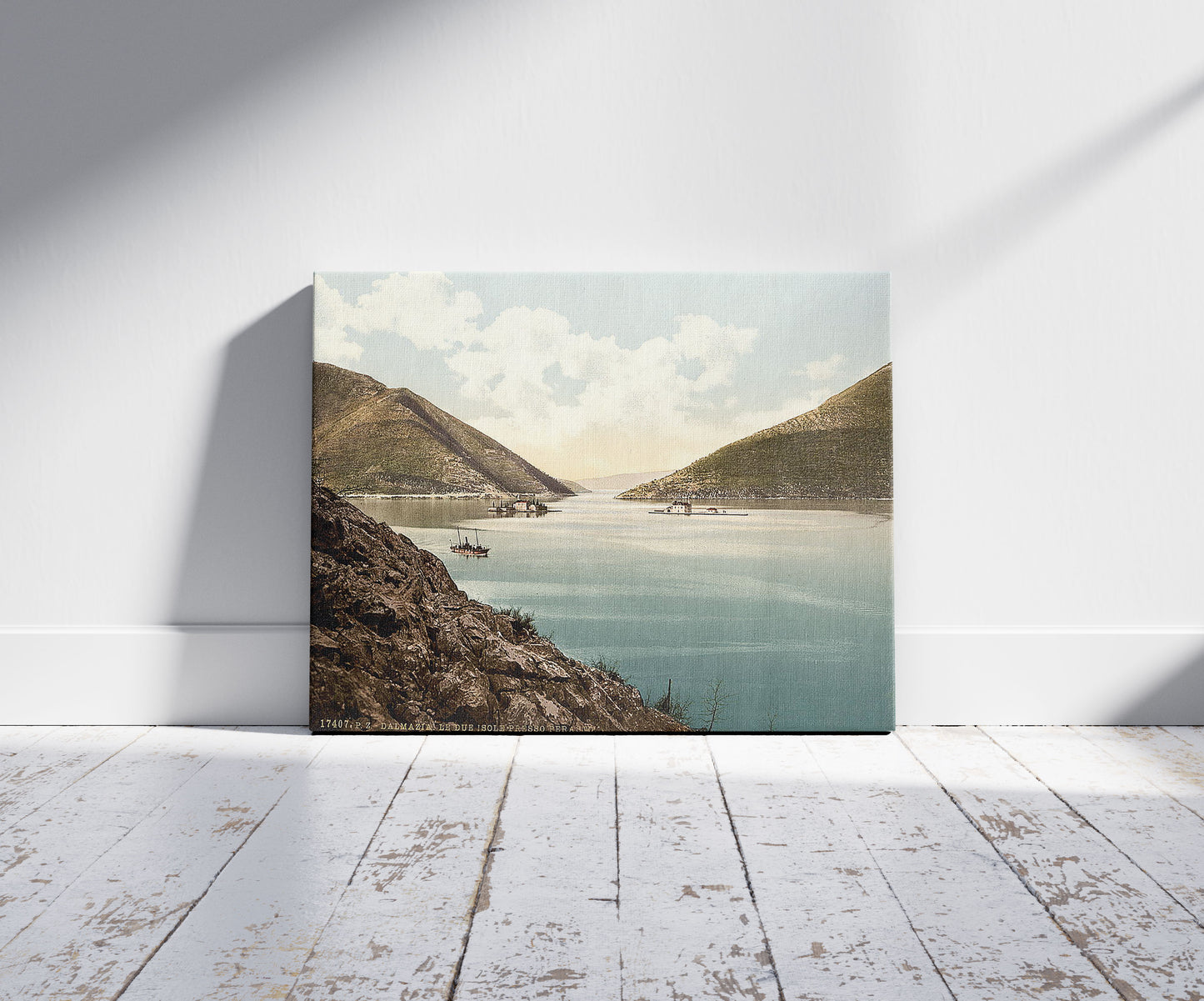A picture of Perasto, Two Islands, Dalmatia, Austro-Hungary, a mockup of the print leaning against a wall